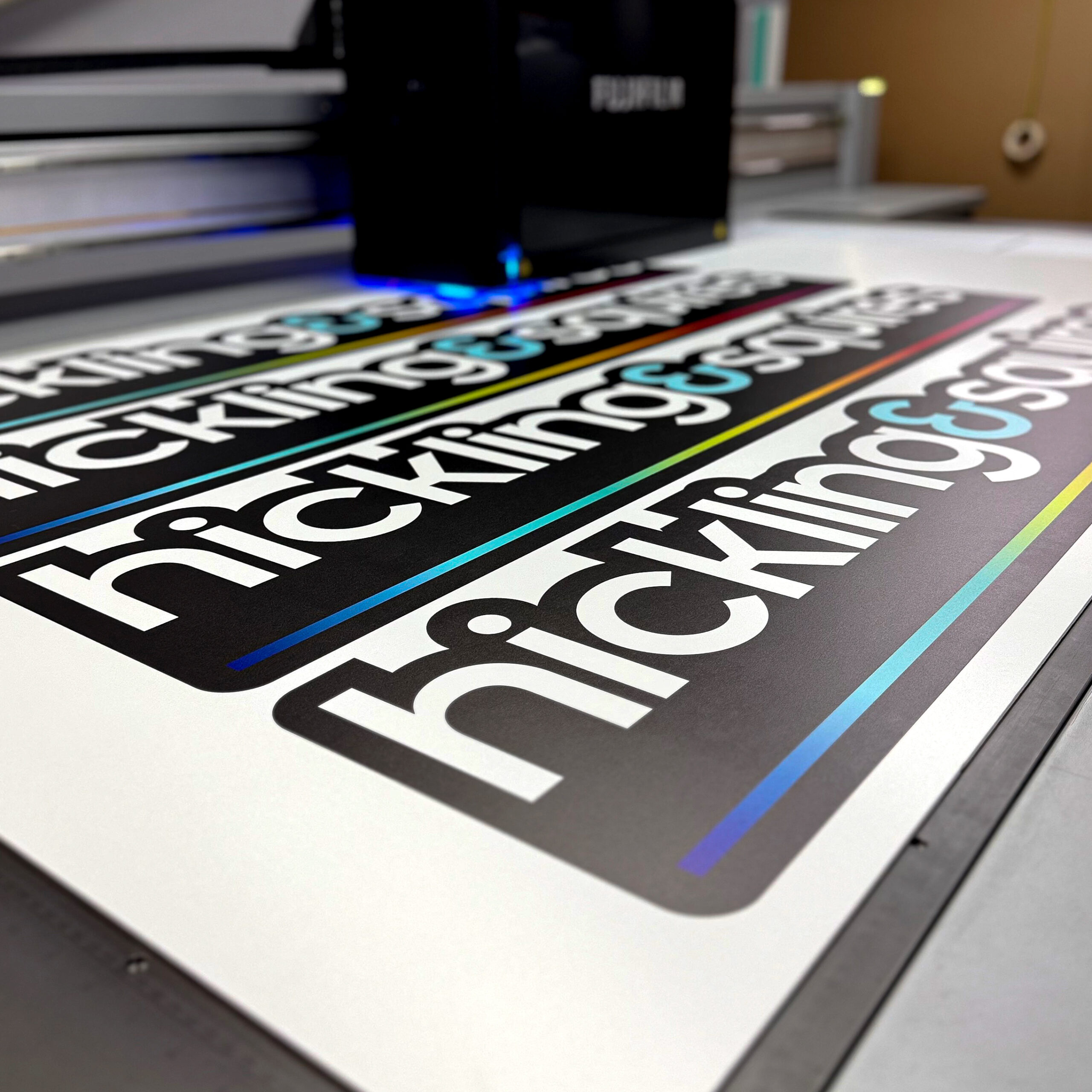 Flatbed printed signage and shaped display graphics